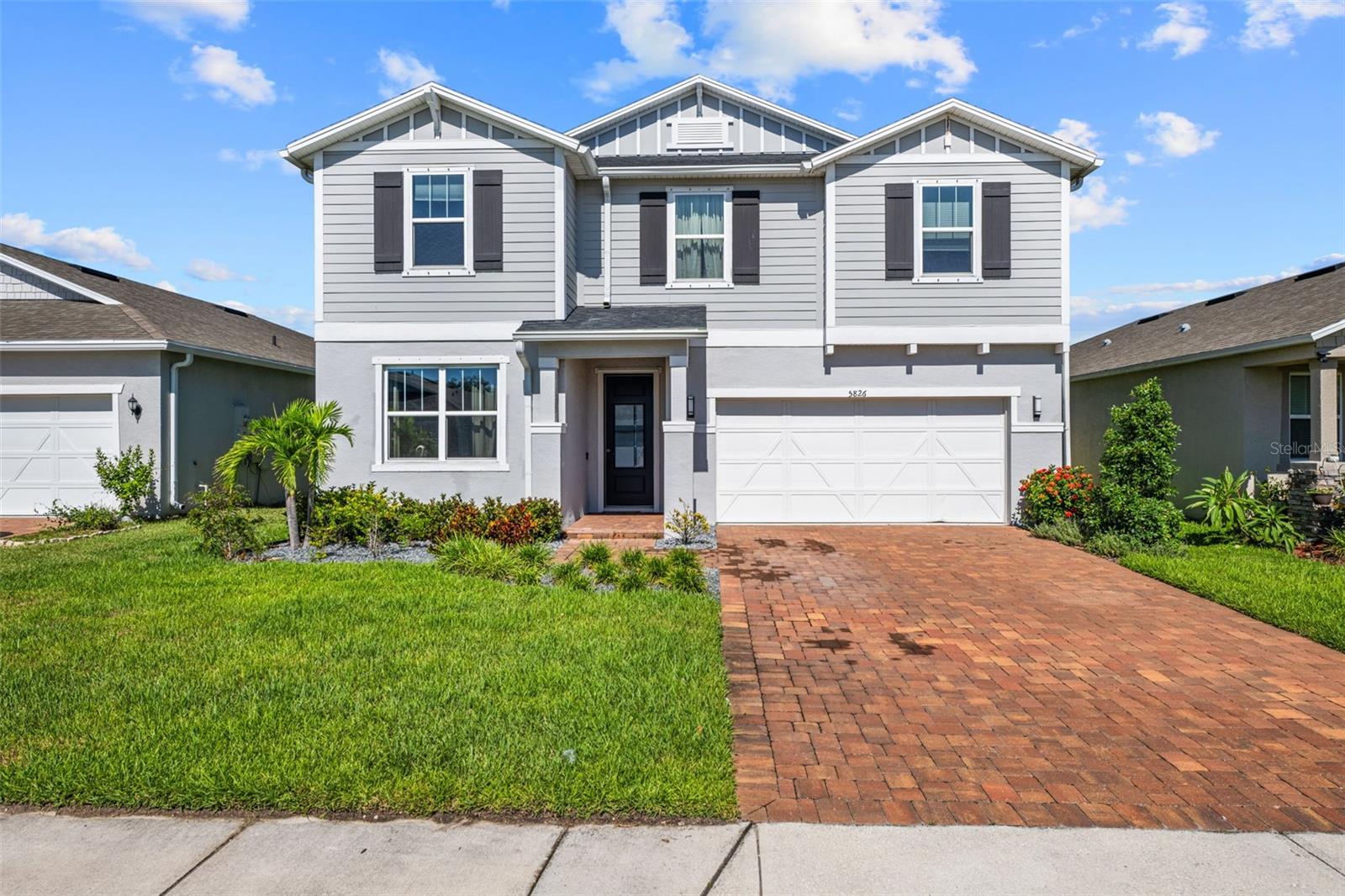Prepare to be utterly enchanted by this exquisite, like-new 2021-built home, now available for rent in the highly sought-after, charming gated community of Avaunce in Lakewood Ranch. From the moment you step inside, you'll be instantly captivated by the seamless blend of modern elegance and inviting warmth, thoughtfully curated through every designer upgrade.
The entire first floor unfolds with the rich, inviting tones of elegant luxury vinyl wood look plank floors, guiding you through a space designed for sophisticated living. Just off the open foyer, discover a serene den/office, a perfect sanctuary for productivity or quiet contemplation, framed by beautiful glass French doors. Beyond, a spacious formal dining room beckons, gracefully overlooking the expansive living room, which is utterly transformed by a gorgeous, custom-built brick fireplace/TV wall – the ultimate focal point for cozy evenings and grand entertaining.
The heart of this home, the stylish kitchen, is a culinary dream come true. Adorned with gleaming granite countertops, a generously proportioned island, and 42-inch cabinets, it's a haven for gourmet creation. Practicality meets perfection with a convenient mudroom, an oversized pantry, and abundant indoor storage, ensuring a place for everything.
Ascend to the second level where tranquility awaits. Here, four spacious bedrooms offer private havens, complemented by a sprawling loft/family room – an incredibly versatile space perfect for lively gatherings, quiet relaxation, or creative pursuits. The primary bedroom is a true retreat, boasting an oversized walk-in closet and a spa-like en-suite bathroom featuring a spacious shower and a double vanity, promising moments of pure indulgence. The thoughtful convenience of an upstairs laundry streamlines your daily routines with effortless ease. The bathrooms exude sophistication with granite countertops, transforming daily rituals into luxurious experiences.
Beyond your private oasis, the Avaunce community extends a warm welcome with its exceptional amenities, including a sparkling community pool and outdoor club house area. This incredible location places everything you desire within effortless reach, from Publix and diverse shopping plazas to an array of restaurants and highly-rated schools. Moreover, with Lakewood Ranch's enviable proximity to Florida's breathtaking beaches, this isn't just a house; it's a lifestyle, a place where cherished memories are made, and where you'll truly be proud to call home!