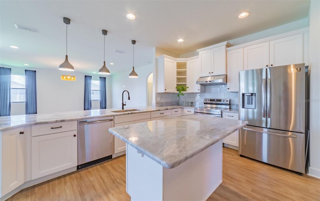 Photo of 570 Sanctuary Boulevard, Winter Haven, FL 33881 (MLS # S5142747)