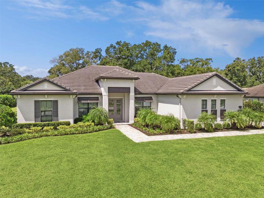 Built in 2020 by Vintage Estate Homes, this exceptional custom residence is a true gem! Nestled within the prestigious gated enclave of Red Tail (Heathrow Country Estates), the property spans half an acre and boasts breathtaking views of the 12th hole on the Red Tail Golf Course.
 This thoughtfully designed home features a desirable 2-way split layout with 3 spacious bedrooms, 2 luxurious full bathrooms, a versatile office that can easily be transformed into a 4th bedroom, gourmet kitchen with granite countertops and an oversized island ideal for entertaining.  Enjoy the grandeur of soaring 10-foot ceilings throughout, enhancing the living experience.  Impeccably adorned with beautiful ceramic tiles, this home offers both style and ease of maintenance. Step outside to the expansive retractable screened lanai, complete with a built-in summer kitchen, perfect for entertaining family and friends all year round. Living in Red Tail provides unparalleled convenience, including access to a spacious clubhouse with a restaurant, a fully-equipped fitness center, a resort-style pool, and well-maintained tennis courts. Enjoy scenic walking paths for leisurely strolls throughout the community. Plus, you're just minutes away from the 429/Wekiva Parkway for easy commuting.