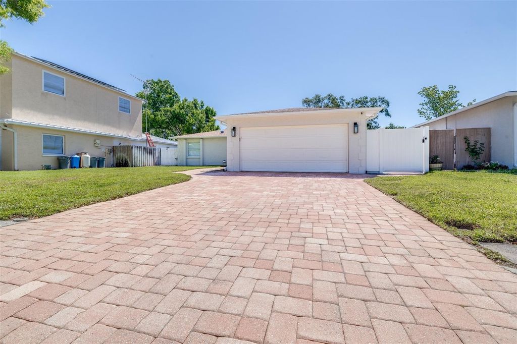 Photo of 11147 Longhill Drive N, Pinellas Park, FL 33782 (MLS # TB8508854)
