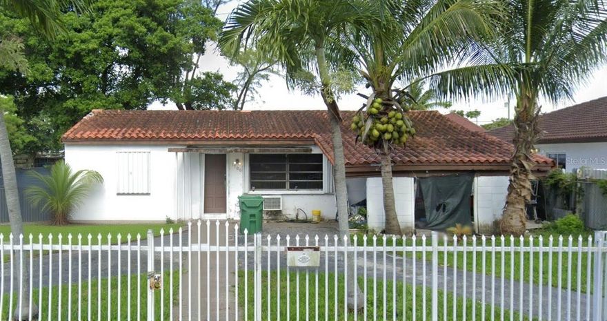 Discover a diamond in the rough waiting for your creative vision! This charming three-bedroom, one-bathroom house presents an exceptional investment opportunity for savvy buyers and fix-and-flip enthusiasts. The property sits on a generous lot with a spacious backyard perfect for expansion possibilities, allowing room to add additional living spaces. The home features practical hurricane shutters and an attractive iron fence in the front yard, adding both security and curb appeal. While this fixer-upper requires light to medium rehabilitation including potential roof replacement and window updates, it offers tremendous renovation potential for those ready to roll up their sleeves. Located in a desirable neighborhood, this property combines an attractive price point with substantial upside potential. The large lot size maximizes your investment possibilities, whether you're planning a complete transformation or considering future additions. The expansive backyard provides endless opportunities for outdoor living spaces, gardens, or even additional structures. Perfect for investors seeking their next profitable project, this house offers the rare combination of solid bones, prime location, and room for creative expansion in an established community. NO ASSIGNABLE CONTRACTS!