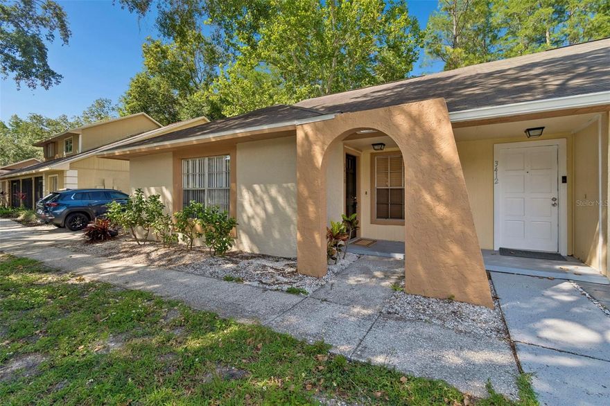 3/2 Villa situated at the crossroads of Lutz/ N. Dale area. Well maintained and perfect for a FTHB. Located just North of Tampa, This beautiful space comes with a beautiful kitchen adorned with solid wood cabinetry. All kitchen appliances included. Spacious open living room area with sliding glass doors leading out to a covered screened Lani with a serene Lake view.  New laminate flooring throughout. large master contains a walk-in closet. Interior laundry room. Property comes with a storage shed included with the purchase. Brand new dock overlooking a majestic lake, the truly perfect place for your morning coffee.  Extra storage room located on rear porch. No HOA fees or CDD fees. Rent ready if desired! Located convenient to shopping centers/fitness centers. Multiple pickleball courts close by. Priced to sell!