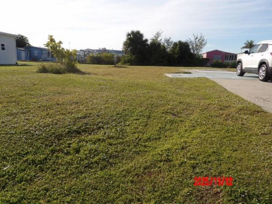 Here is a vacant lot well maintained and priced to sell in The desirable Holiday Mobile Estates 3rd addition. 
The owner is still paying the monthly Englewood Water Bill of about $58. in order for a new owner to avoid paying that $14,900
Impact fee upon bringing the home in.
The HOA is optional at $50. a year.
While the lot remains vacant The Edgewater Clubhouse will let you pay about $75. a year to avoid having to pay the $1000 one time buy in...  While the lot is without a home on it, there are no facilites offered.  This is optional to join as well.
There is a delightful Swimming Pool, Pickle board and Bocce ball, Tennis and more.
The Clubhouse has an entertainment commitee to keep you busy if you want to enjoy this active Adult Community.
Themed Dinner Dances, Potlucks, Crafts, Cards, Bingo and Live Music to start with.
This Community is Pet Friendly and Golf Carts are Welcome.
Englewood offers Public boat Ramps as well as Public Golf Courses.
Beautiful beaches 15 minutes away.  
The Historic District on Dearborn has monthly car shows, Live Music, adorable shops, a farmers market, Restaurants, Parades and more.

This Lot is being  Sold-As-Is, subject to buyer's approval.

The information here is deemed reliable and to the best of our knowledge, but buyer/buyer's agent should do their due diligence.