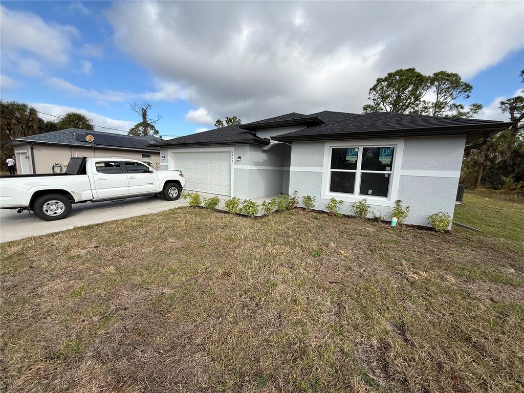 Photo of 1926 Snover Avenue, North Port, FL 34286 (MLS # A4682936)