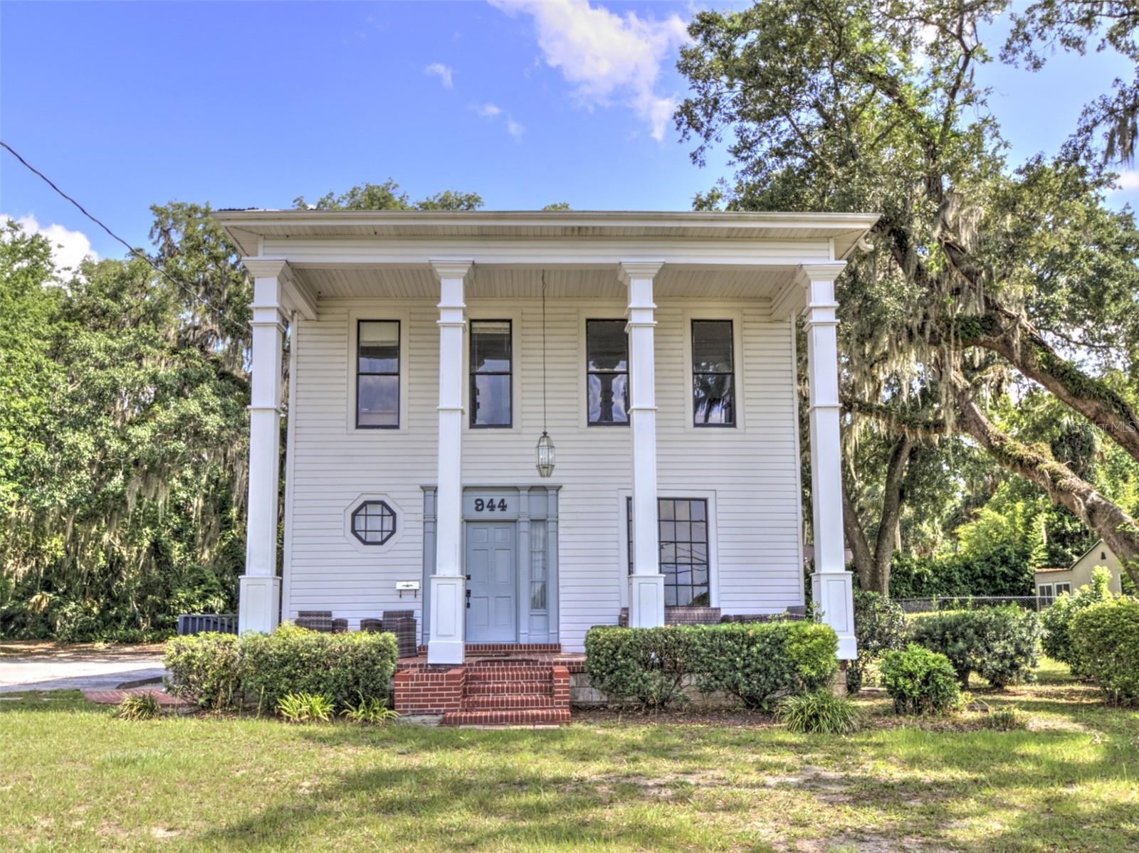 Location, Location, Location. This 2-story office building is located on the main 4 lane road in Ocala, Silver Springs BLVD, (HWY 40) with 114 ft of frontage! This parcel is over half an acre at .61 with ample parking. The front of the Victorian building is a grand entrance with the high columns and red brick porch. On the side of the building is the wood ramp for accessibility. The inside of the office is full of historic charm, solid original wood floors on the staircase and upstairs, high ceilings, built-ins, solid wood trimmings, and a full kitchen. There are 6 total private offices, one office with full private bathroom, 4 bathrooms, 1 large conference room, 1 dedicated workspace downstairs, 2 lobby areas, and dedicated closed storage. There is 3120 sqft total under roof. There also is an already existing illuminated sign on Silver Springs BLVD. The building is not a registered historic building and can be removed. The zoning is B2. This is a great opportunity!