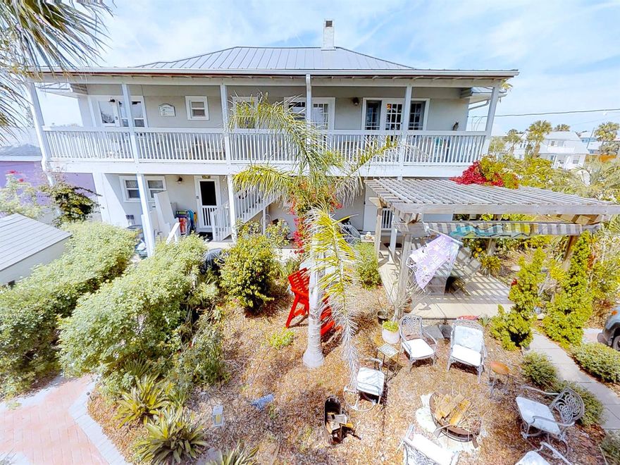 Walk to the beach and to Flagler Ave! This is one of the best value price/sq ft on North Beach Side!! This historic building has 5 bedrooms, 5 baths! One of a kind property that could be a big family home or 4 units, with 3 apartments that can be rented short term, plus one extra spacious 2 bedroom apartment. Possibilities are multiple: from a family compound, a bed and breakfast, to a wedding venue, your dreams have no limits! This house will seduce you with its old charm, while upgraded with modern and quality features, like the top quality aluminium roof, or the spacious kitchen with its butcher counter tops. The tropical double lot, will give you plenty of space and privacy. Its proximity to the beach and a short walk to Flagler Ave makes it perfect as a location. Don't wait, bring your family, your friends, or start your own business!