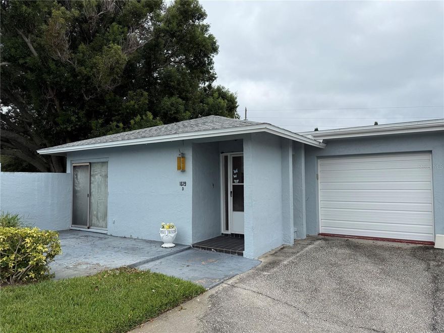 LOWEST priced villa w/Garage @ Highland Lakes! Excellent opportunity for buyer’s remodel vision . Great floorplan with tons of natural light. Tile thruout unit. Brand new Water Heater and commodes. Huge primary bedroom has TWO walk in closets. Galley kitchen leads to garage with washer/dryer and utility sink. Highland Lakes is North Pinellas’s premier 55 and up community, featuring 3 golf courses, pools, waterfront activitities, clubhouse, performance theater, wood working shop, card clubs and so much more. Close to shopping and the beaches. Friendly neighbors.