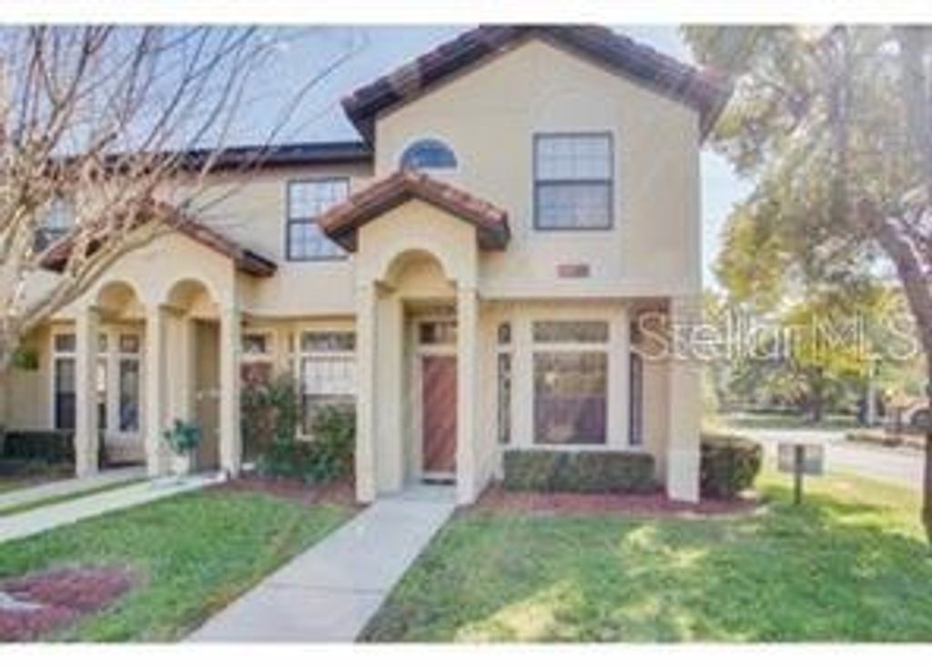 Photo of 6037 Scotchwood Glen #8, Orlando, FL 32822 (MLS # O6420471)