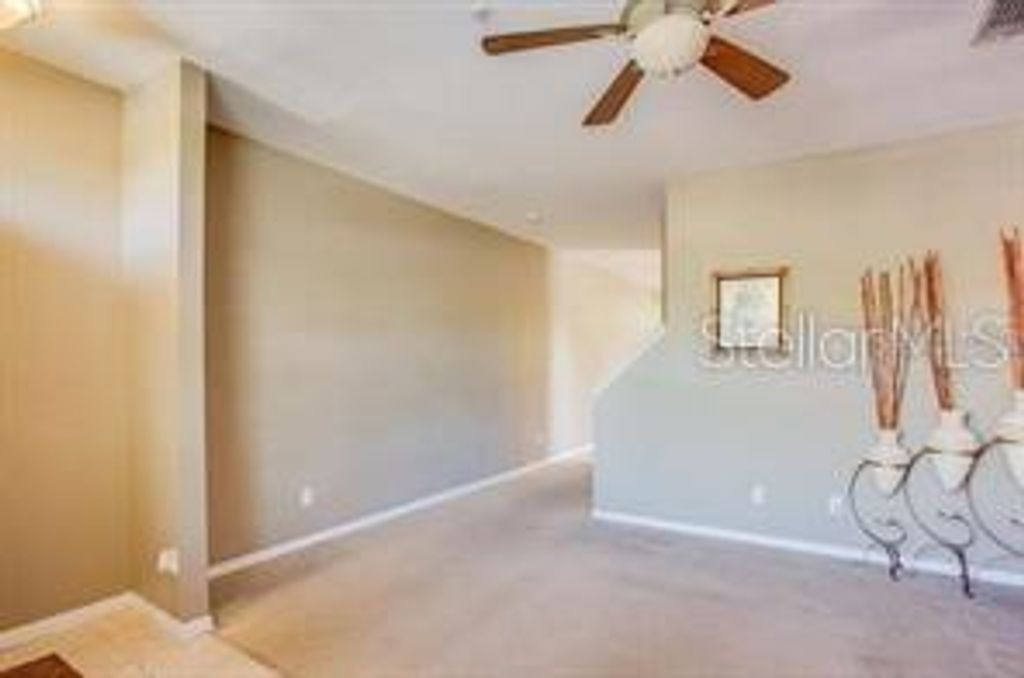 Photo of 6037 Scotchwood Glen #8, Orlando, FL 32822 (MLS # O6420471)
