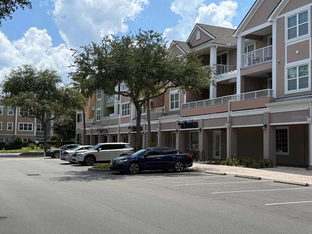 Photo of 6663 Queens Borough Avenue #206, Orlando, FL 32835 (MLS # R4911871)