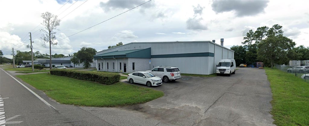 Photo of 15424 Aviation Loop Drive, Brooksville, FL 34604 (MLS # W7889520)