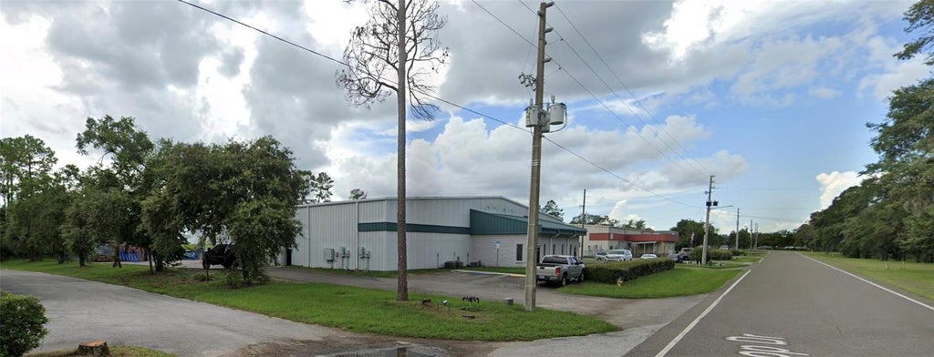 Photo of 15424 Aviation Loop Drive, Brooksville, FL 34604 (MLS # W7889520)