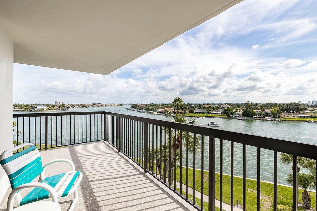 PREMIUM COASTAL LIVING in this 2/2 waterfront condo in St Pete Beach just steps from the crystal sands of Treasure Island beaches. Discover the gorgeous updates, open floor plan and modern living style in this premium rental. Enjoy the large wraparound balcony for beautiful sunrise vistas and water views all around. Luxury amenities in the community include a heated waterfront pool and spa, state-of-the art fitness room, 7 HarTru tennis courts with some lined for pickleball. Active social life within the community with the beautifully updated clubhouse. Waterfront decks with barbecue grills available. Shuffleboard onsite as well. Onsite management and maintenance staff keep the property looking great. Make your appointment today!
