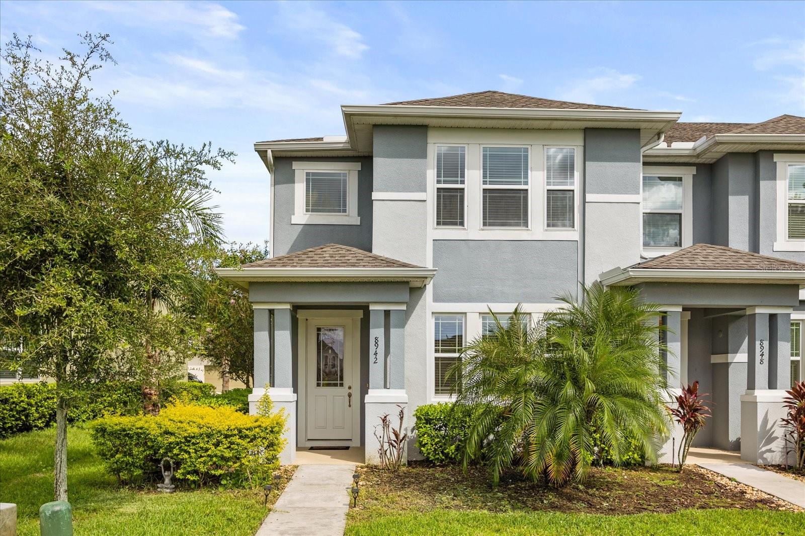 Welcome to this stunning corner unit townhouse built in 2020, offering 3 spacious bedrooms (located in the 2nd floor), 2 full bathroom in the 2nd floor and half bathroom on the first floor, and a 2 car garage. Perfectly positioned right in front of a serene lake, you’ll love starting your mornings with a coffee and peaceful water views. Enjoy low maintenance living, landscaping is fully handled by the HOA, giving you peace of mind. Located in one of Central Florida’s most desirable areas, this home is just 10 minutes from major theme parks, the vibrant Hamlin and Horizon West areas, and only minutes from restaurants, supermarkets, and even a fire station just 5 minutes away. If you're looking for convenience, charm and location, this home truly has it all. Special lender credit of $2,000 available when financing through Cross Country Mortgage.