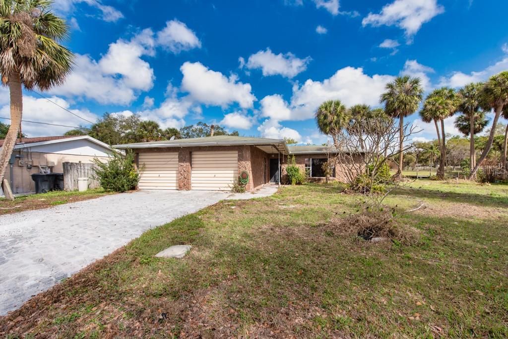 Photo of 8848 W Millpoint Road, Riverview, FL 33578 (MLS # TB8485900)