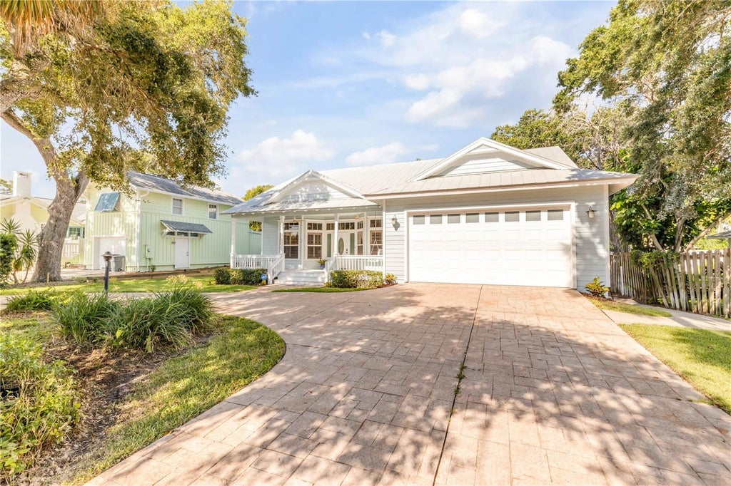 Photo of 410 S Peninsula Avenue, New Smyrna Beach, FL 32169 (MLS # NS1088985)