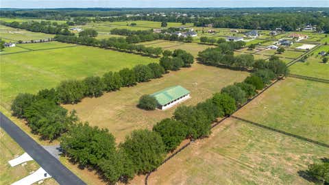 Tiny photo for 6957 NW 54th Loop, Ocala, FL 34482 (MLS # OM724604)