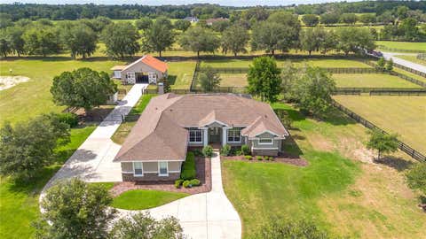 Photo of 6957 NW 54th Loop, Ocala, FL 34482 (MLS # OM724604)