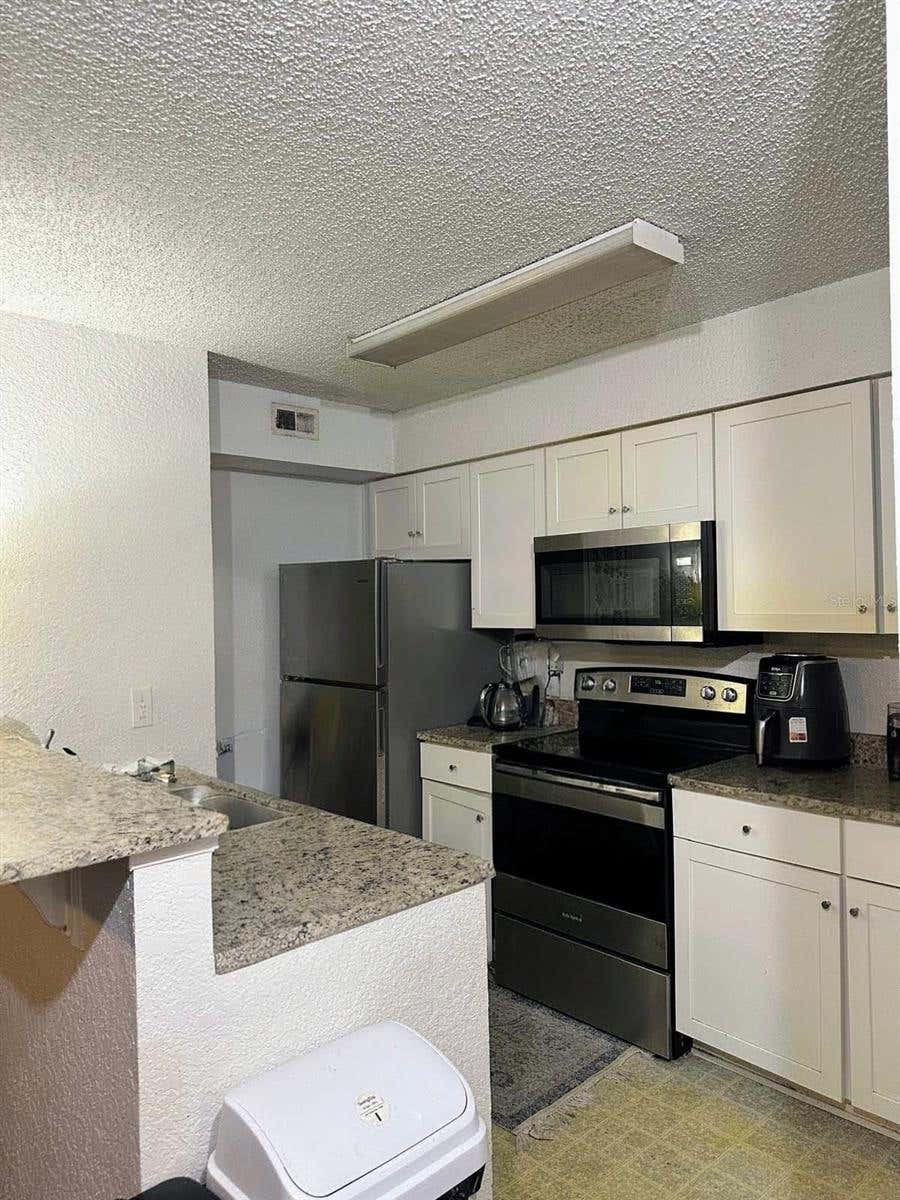 Photo of 2214 Metropolitan Way #2210, Orlando, FL 32839 (MLS # S5155722)
