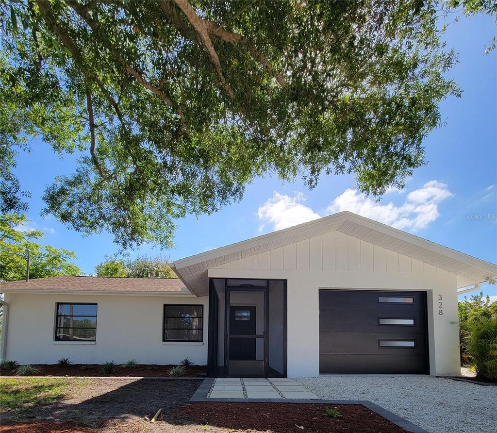 Photo of 328 E Bay Street, Osprey, FL 34229 (MLS # O6400514)