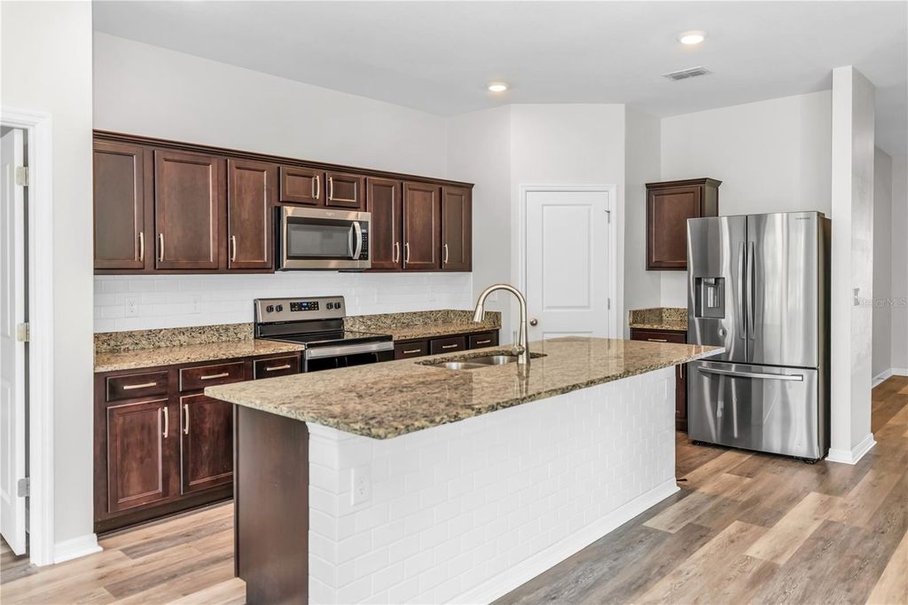 Photo of 2855 Neverland Drive, New Smyrna Beach, FL 32168 (MLS # O6401091)
