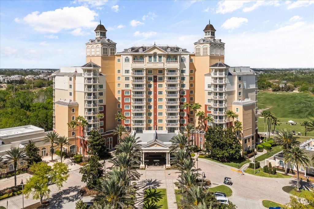 Photo of 7593 Gathering Drive #702, Reunion, FL 34747 (MLS # O6392566)