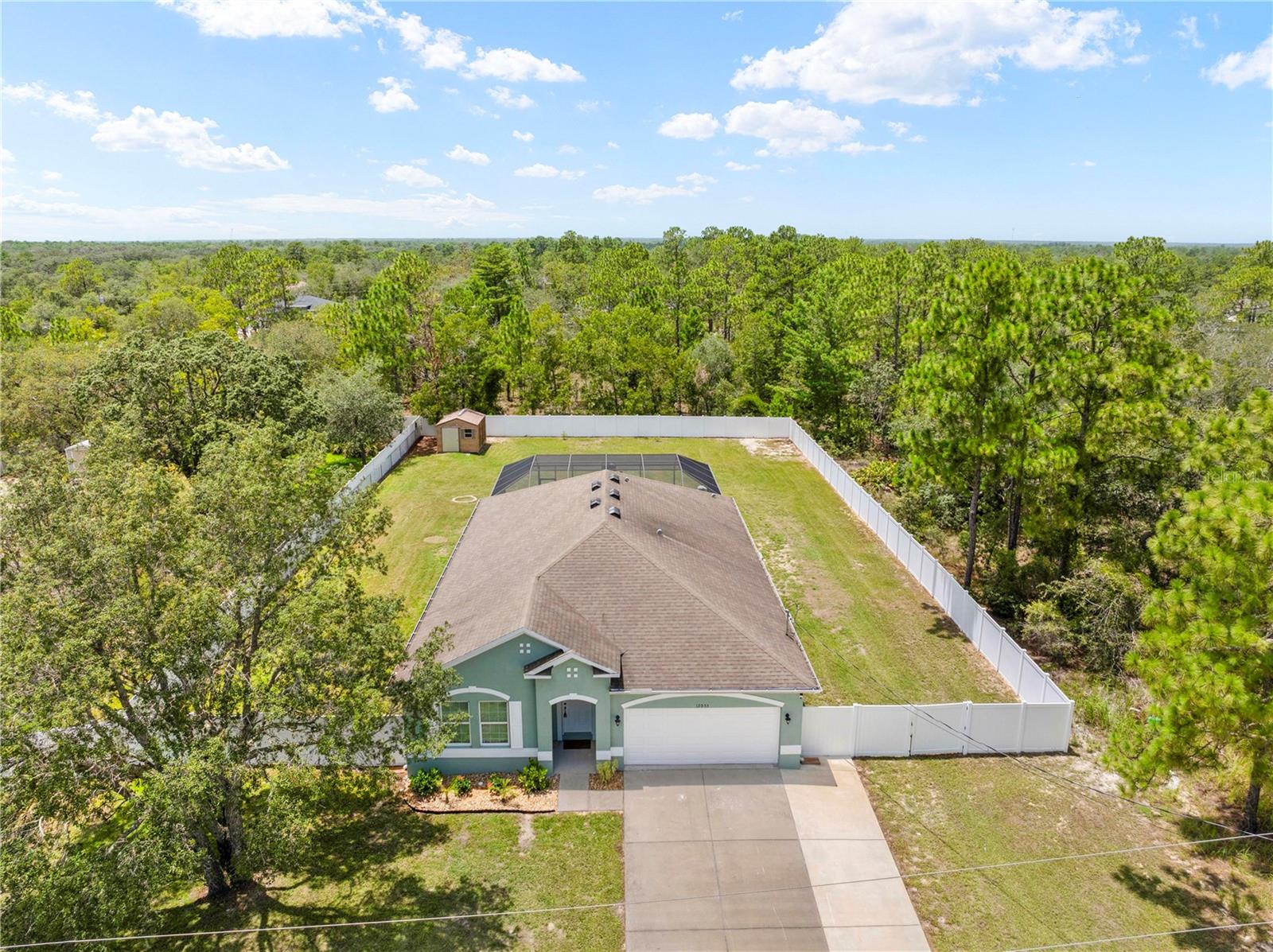Experience the perfect balance of modern luxury and peaceful seclusion at this exquisitely remodeled home, nestled in the coveted Royal Highlands community of Brooksville. This home showcases upgraded finishes, thoughtful upgrades, and an ambiance that blends elegance with everyday comfort. Step inside to expansive, light-filled living spaces featuring open-concept design, custom touches, and a beautifully updated kitchen. Every detail has been curated with craftsmanship and care, creating a timeless, move-in-ready retreat ideal for entertaining or quiet relaxation. Outdoors, your private oasis awaits. Enjoy the screened-in pool and generously sized, fully fenced yard, perfect for hosting, unwinding, or simply soaking in the serenity of your surroundings with plenty of room to expand — all with no HOA or deed restrictions to limit your vision!! Located just minutes from Weeki Wachee Springs, Pine Island Beach, and the Suncoast Parkway, you’ll enjoy the best of both worlds — natural Florida beauty with a quick commute to amenities. This prime location is ideal for those seeking a slower pace without sacrificing convenience — with effortless access to major roadways, coastal escapes, and central Florida attractions. Schedule your private showing today!!