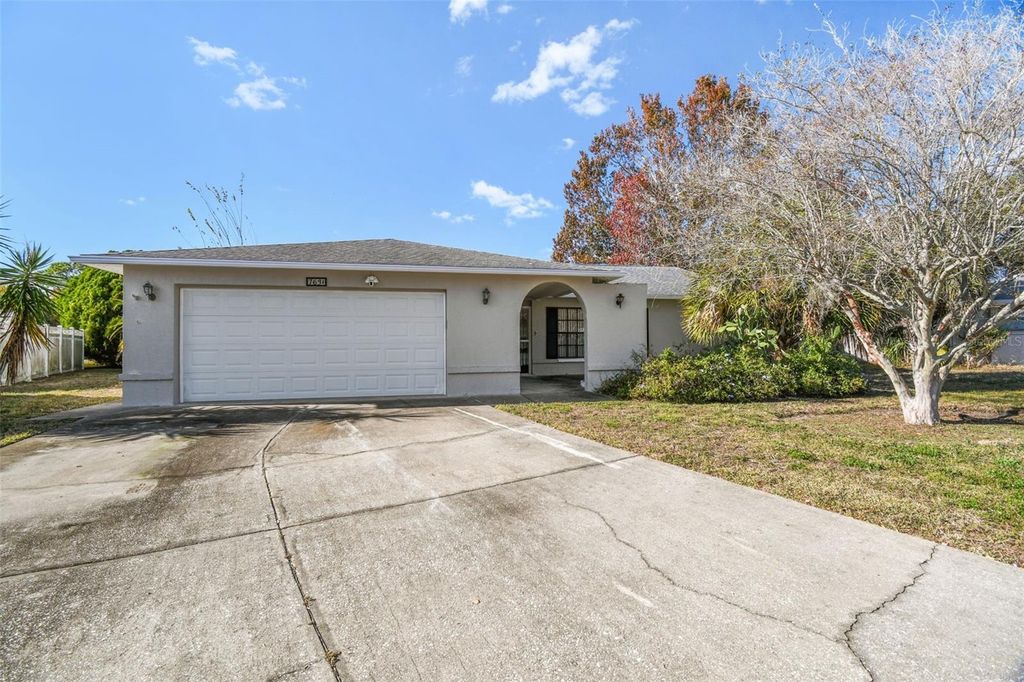Photo of 7631 Summertree Lane, New Port Richey, FL 34653 (MLS # W7881498)