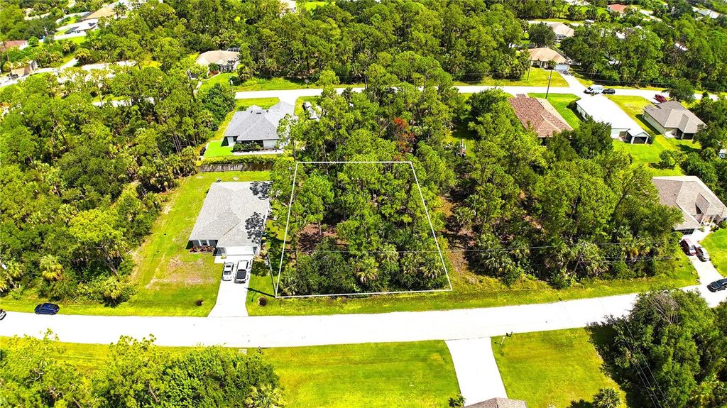 Photo of 15074 Faulkner Avenue, Port Charlotte, FL 33953 (MLS # C7513584)