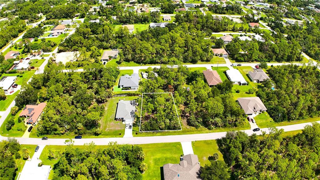 Photo of 15074 Faulkner Avenue, Port Charlotte, FL 33953 (MLS # C7513584)