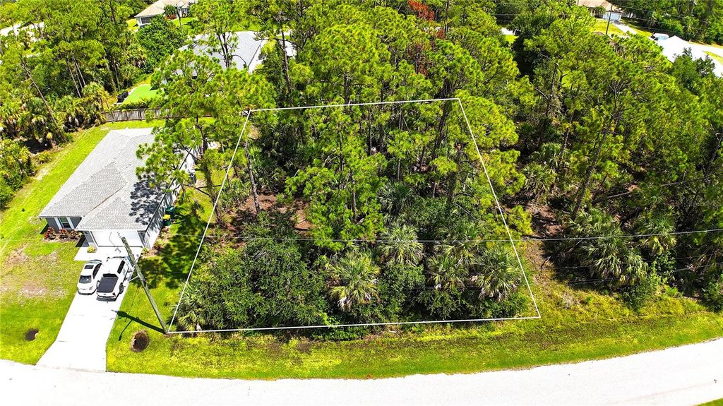 Photo of 15074 Faulkner Avenue, Port Charlotte, FL 33953 (MLS # C7513584)