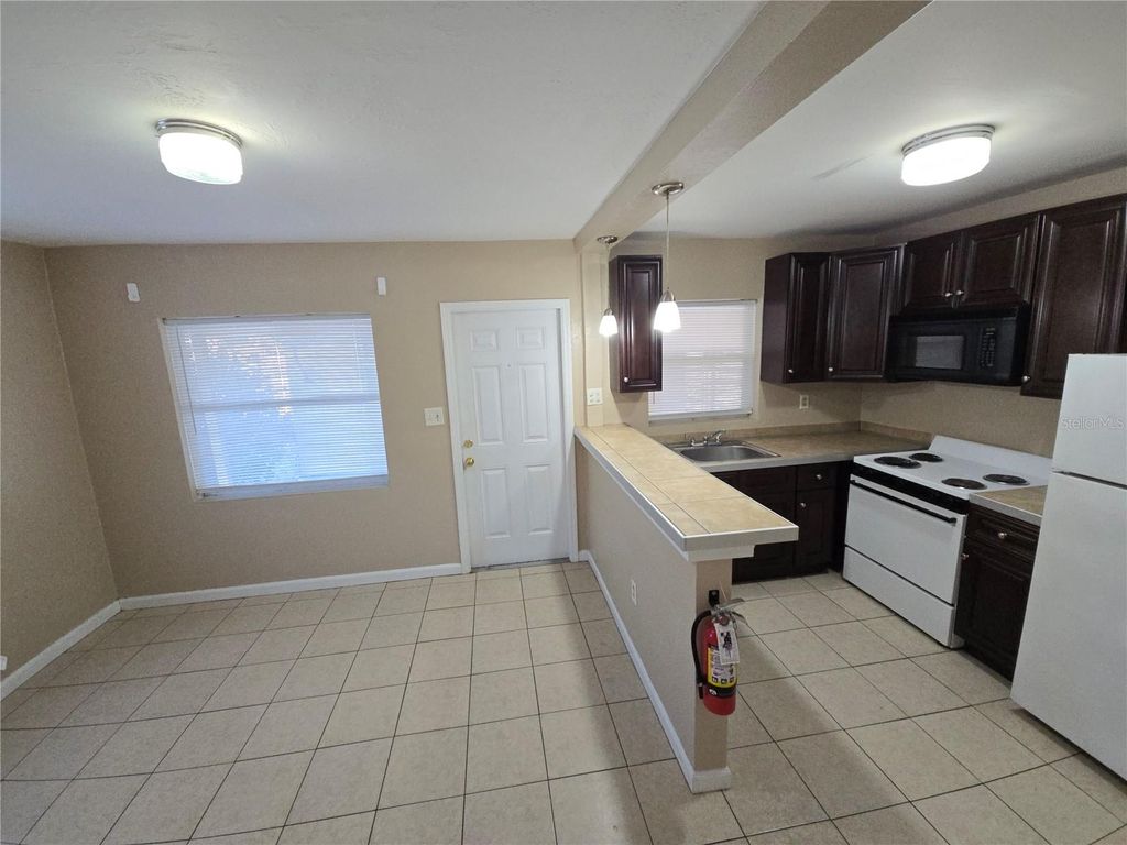 Photo of 953 6th Street SE, Winter Haven, FL 33880 (MLS # L4960452)