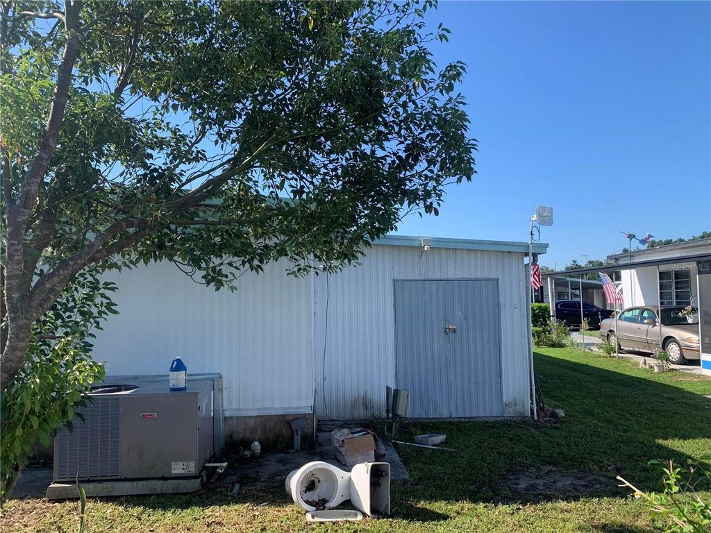 Photo of 37111 Sandra Avenue, Zephyrhills, FL 33542 (MLS # O6346475)