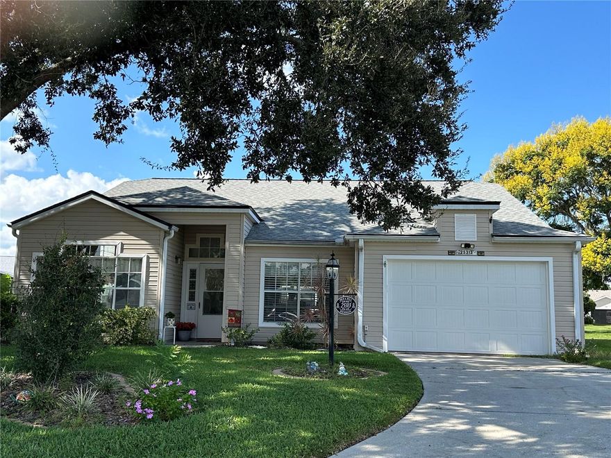 Your search is over! This turnkey 2BR,2B home has a large living room/dining room plus a beautiful 15'X18' family room and a 270 sq. ft enclosed lanai. The laminate floors throughout are the same. No patchwork floors. The kitchen and both bathrooms have been updated. The living room and dining room are perfect for more formal entertaining and the large family room is in the center of the home provides the perfect place for those laid back enjoyable hours. The kitchen is open to the family room so you can enjoy visiting with family and friends as you work. The kitchen has a delightful eating area. This is a split floor plan with the primary and guest bedrooms are on opposite sides of the home providing you and your guests privacy.  The primary bedroom has has a walk-in closet and an ensuite bath.  It has double vanities, a new walk-in shower and garden tub. There is a private door to the lanai. The guest bedroom is cheerful and bright. The guest bath has a new granite counter top and wash basin, and a shower/tub combination. Both baths have new luxury vinyl waterproof floors matched to the laminate flooring in the rest of the home. The wonderful enclosed lanai is a real bonus adding so much additional space. This home is located on a beautiful court in a warm friendly and active community. THE GOLF CART IS INCLUDED (BATTERIES I YEAR OLD) A new roof and new AC in 2024 plus new hurricane proof garage door and opener add peace of mind to the package. All you need to do is pack your bags and move right in.  It is time for you to start living the life you have dreamed about in the Florida sunshine. The Plantation at Leesburg is a a gated 55+ community that offers a great lifestyle and is an active community. It boasts 3 activity center, 3 pools with spas, 2 gyms, tennis and pickleballs courts, a driving range and 2 18 hole golf courses, along with many other amenities, clubs, etc. The Plantation at Leesburg is a a gated 55+ community that offers a great lifestyle and is an active community. It boasts 3 activity center, 3 pools with spas, 2 gyms, tennis and pickleballs courts, a driving range and 2 18 hole golf courses, along with many other amenities, clubs, etc.  Hurry up, come join the fun!