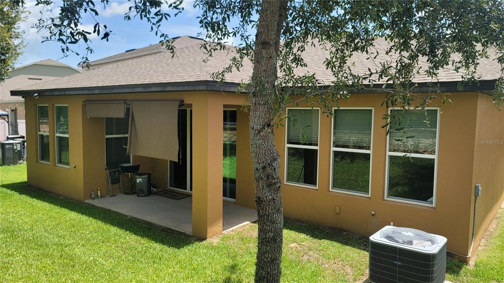 Photo of 920 Boxelder Avenue, Minneola, FL 34715 (MLS # R4911528)