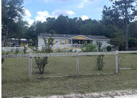 Photo of 21170 SE 67th Place, Morriston, FL 32668 (MLS # OM723878)