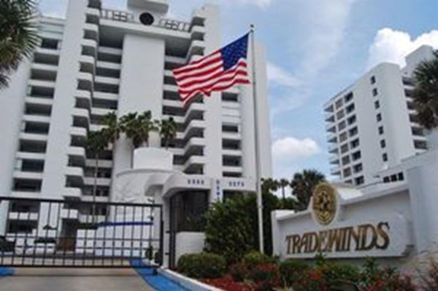 Stunning 3 bedroom, 3 bath Condo on the 1st floor in the prestigious Tradewinds Condos with panoramic views of the Atlantic Ocean!
Private entrance to condo with a porch in the front and deck off the back, walk out from the patio to the pool and beach. This is a huge unit, beautiful, bright, and full of natural light!
Kitchen fully stocked, including a bar area between the living room and kitchen.  Living room boasts wall to wall, floor to ceiling windows/sliding glass doors offering beautiful views of the ocean! New TVs with surround sound, keep up to date with a private wifi connection and high-speed cable. Oceanfront master bedroom has a king bed and gorgeous views of the ocean, 2nd and 3rd bedroom have queen beds, each room has an en suite bathroom. Washer/Dryer in unit.
Tradewinds amenities include large pool, small heated pool, fitness center, hot tub, tennis court and shuffleboard.
This Condo is centrally located to provide easy access to the area's shopping, dining, golfing, boating, nature activities, and much more. Best of all, New Smyrna Beach is the nearest beach to world-famous attractions such as Walt Disney World, Sea World, Epcot Center, Universal Studios & Cape Canaveral NASA Complex. These popular Florida family vacation spots are an easy one hour to one hour and 15 minute drive from New Smyrna Beach. Call for pricing and availability! ;CleaningFee: 175 ;Security: Lobby