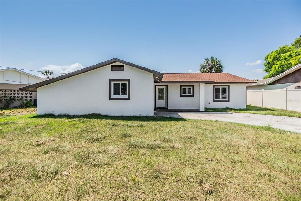 Photo of 8705 Tahiti Lane, Tampa, FL 33615 (MLS # TB8461036)