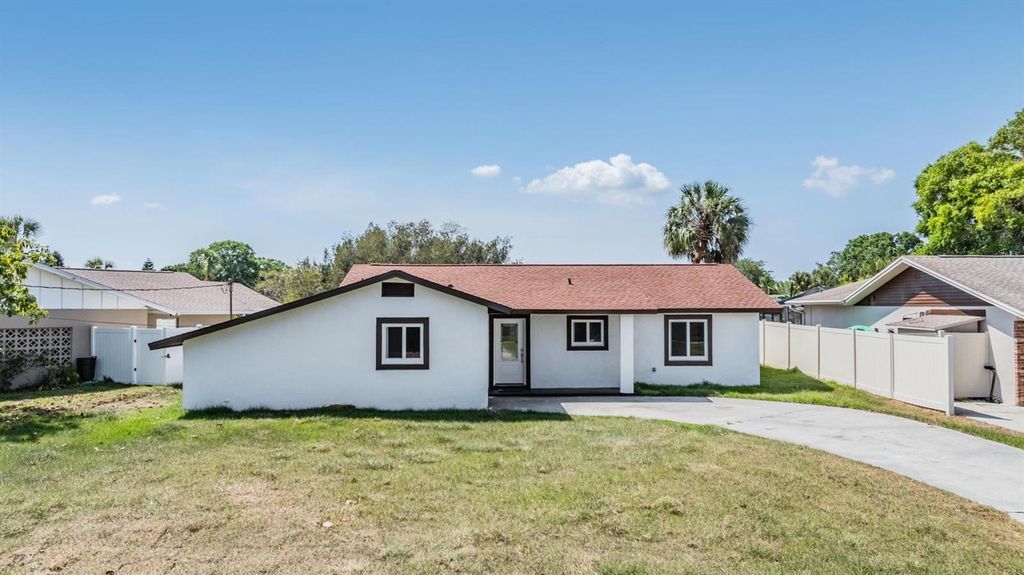 Photo of 8705 Tahiti Lane, Tampa, FL 33615 (MLS # TB8461036)