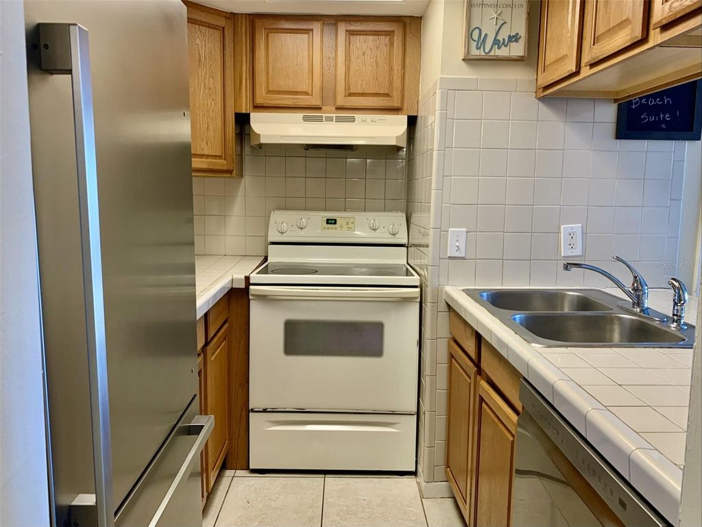 Photo of 4712 Marine Parkway #203, New Port Richey, FL 34652 (MLS # TB8397714)