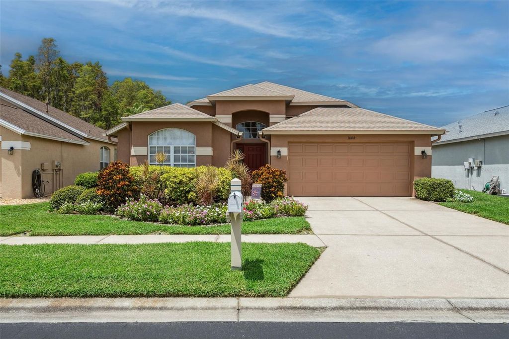 Photo of 31102 Wrencrest Drive, Wesley Chapel, FL 33543 (MLS # TB8404801)