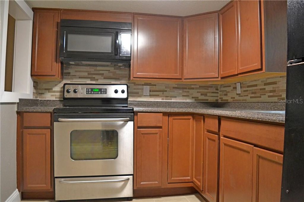 Photo of 647 S Delaware Avenue, Deland, FL 32720 (MLS # O6362015)