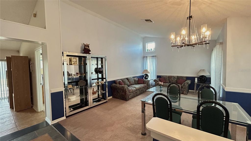 Photo of 7706 Chaplin Lane, Orlando, FL 32818 (MLS # O6373206)