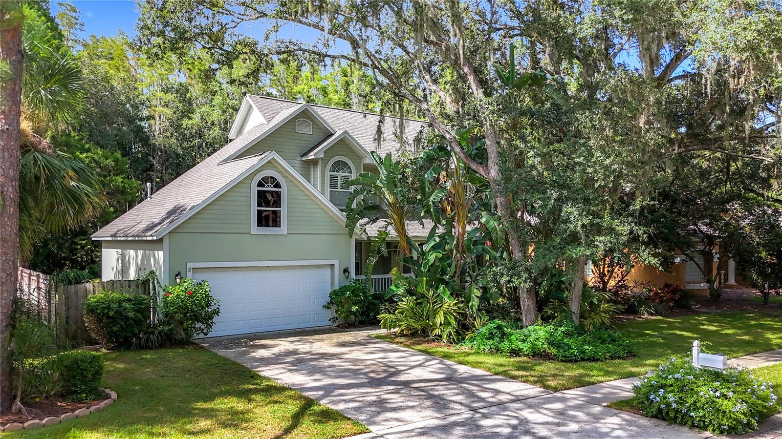 Welcome to your dream home at 7204 Wareham Dr, Tampa, FL 33647, nestled in the prestigious Tremont at Tampa Palms community! This stunning two-story pool home, custom-built by Hannah Bartoletta, offers 4 bedrooms, 2.5 bathrooms, and an attached 2-car garage, perfectly situated on a serene wooded conservation lot. Step inside to a functional main level featuring an open kitchen and family room area, complemented by separate living and dining rooms and a convenient half bathroom. The family room boasts a soaring cathedral ceiling and cozy fireplace, with expansive windows showcasing tranquil views of the inground, screen-enclosed pool and lush conservation backdrop. The updated kitchen is a chef’s delight, equipped with wood cabinets, granite countertops, stainless steel appliances, and a wine refrigerator. The primary bedroom, located on the first floor, offers a luxurious retreat with an en-suite bath, while a secondary bedroom adds versatility. Upstairs, two additional bedrooms share a full bathroom, providing ample space for family or guests. Outside, a covered patio overlooks the sparkling pool, perfect for relaxing or entertaining against the peaceful wooded setting. Residents of Tremont at Tampa Palms enjoy access to premier amenities, including a community pool, fitness center, tennis courts, and scenic nature trails, all within the gated enclave. Just minutes away, explore attractions within 20 miles, such as Busch Gardens Tampa Bay (10 miles) for thrilling rides, Zoo Tampa at Lowry Park (12 miles) for family-friendly animal encounters, and the vibrant dining and shopping at Wiregrass Mall (8 miles). With easy access to I-75, the University of South Florida (7 miles), and downtown Tampa’s cultural hubs (15 miles), this home combines luxury, convenience, and natural beauty in one of Tampa’s most coveted neighborhoods. Peace of mind with 2022 AC, 2023 Roof and 2021 Water Heater.
