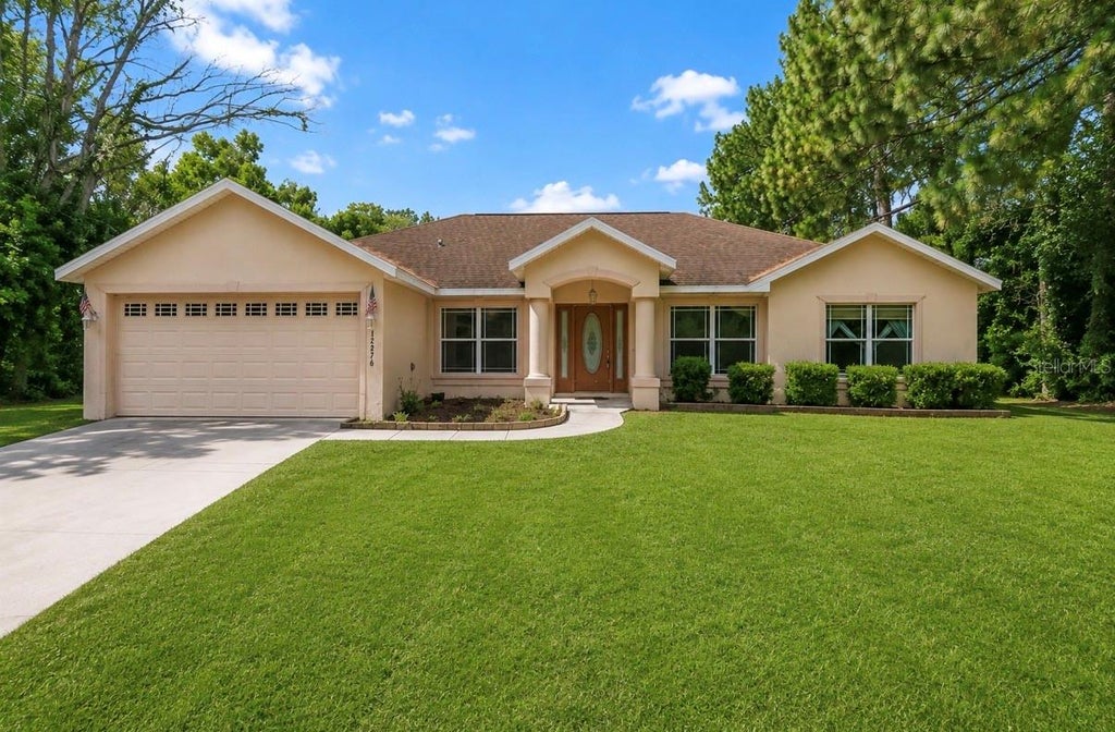 Photo of 12276 Villa Road, Spring Hill, FL 34609 (MLS # TB8537030)
