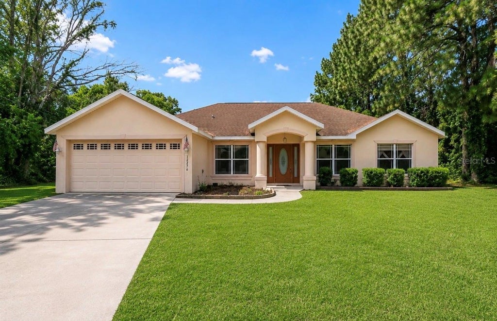Photo of 12276 Villa Road, Spring Hill, FL 34609 (MLS # TB8537030)