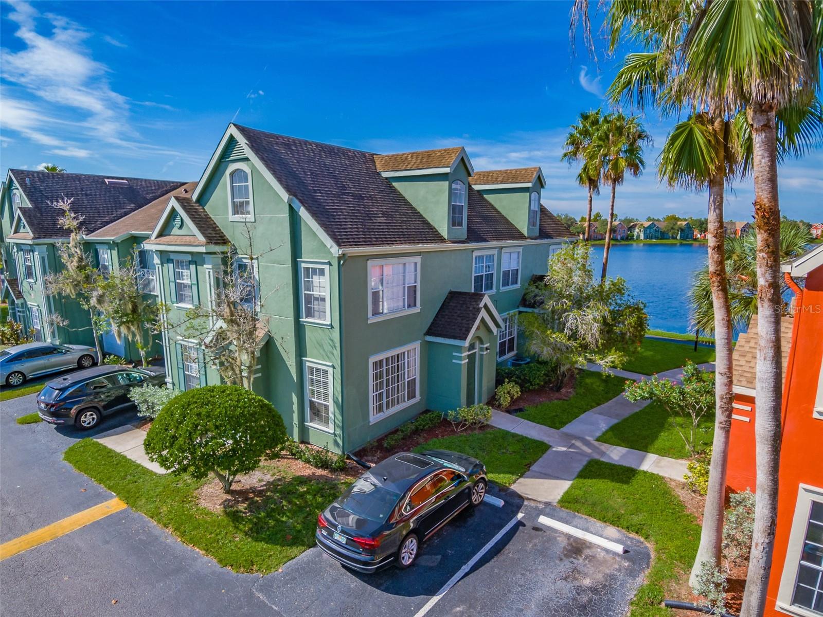Very rare 3 bedroom/2 bathroom + Loft (Bonus room / Den) condo in the private gated Lake Chase Condo community in Westchase!. This unit comes with 3 Carports! This home offers lots of natural light, an open floor concept, and grand lofty ceilings having the largest floor plan in Lake Chase communities. White shaker Kitchen cabinetry with stainless steel appliances, open floor plan. Beautiful laminate flooring throughout. The floor plan opens up to the dining & living rooms. Loft is perfect for a playroom, or office! Large and updated master suite with large walk-in. All bedrooms are very spacious and have big closets. Newer HVAC, Washer & Dryer and much more...Enjoy walking paths around the beautiful lake in the center of the community. The community amenities offer 2 resort pools, a basketball court, tennis courts, sand volleyball courts, a car wash area, a fitness center, a playground, and a beautiful clubhouse that is available for reservation. Two private gated entrances from W Linebaugh or Sheldon for easy access to all Westchase has to offer & a quick shot to the Veterans Expressway. Just over a mile (1.1 miles) to West Park Village with cafes, restaurants, nightlife, gyms, parks, a playground, splash park, and more! Zoned for Excellent Schools!! Less than 30mins to downtown Tampa, Tampa International Airport, and award-winning gulf beaches! Schedule your showing today! If you snooze you will lose