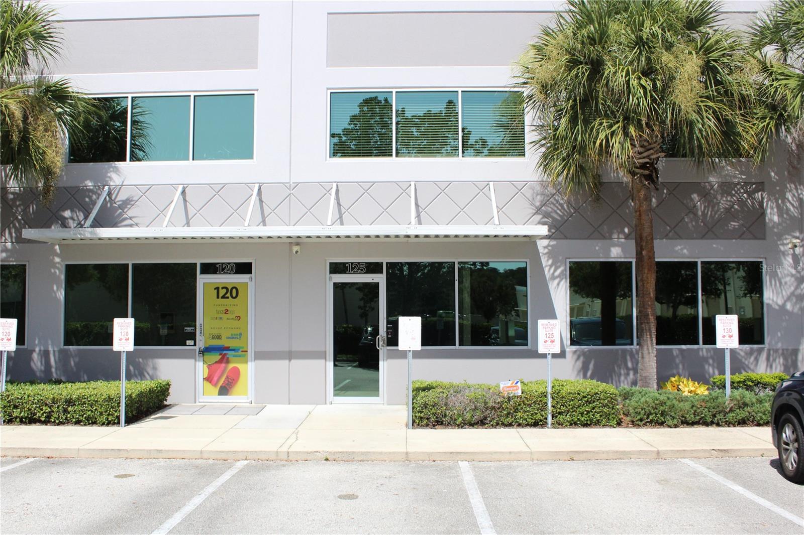 This upgraded and professionally maintained industrial/office unit offers 3,635 square feet of adaptable space, ideal for a variety of business uses including light manufacturing, distribution, tech, or creative operations. The unit features 980 square feet of high-clearance warehouse space with a 20-foot clear height and an included vertical lift module system, providing efficient storage and logistics capabilities. The main floor includes five offices, a reception area, conference room, kitchen, two restrooms, a storage room, and a dedicated security control room. The second floor offers a spacious executive office and a versatile flex room that can serve as an additional office or meeting space. Access is streamlined with two dock-high loading doors and a loading dock access point. The unit also includes six dedicated parking spaces at the front, with additional parking available in the rear. This facility delivers a clean, functional, and professional environment suited for businesses seeking a flexible and efficient workspace.