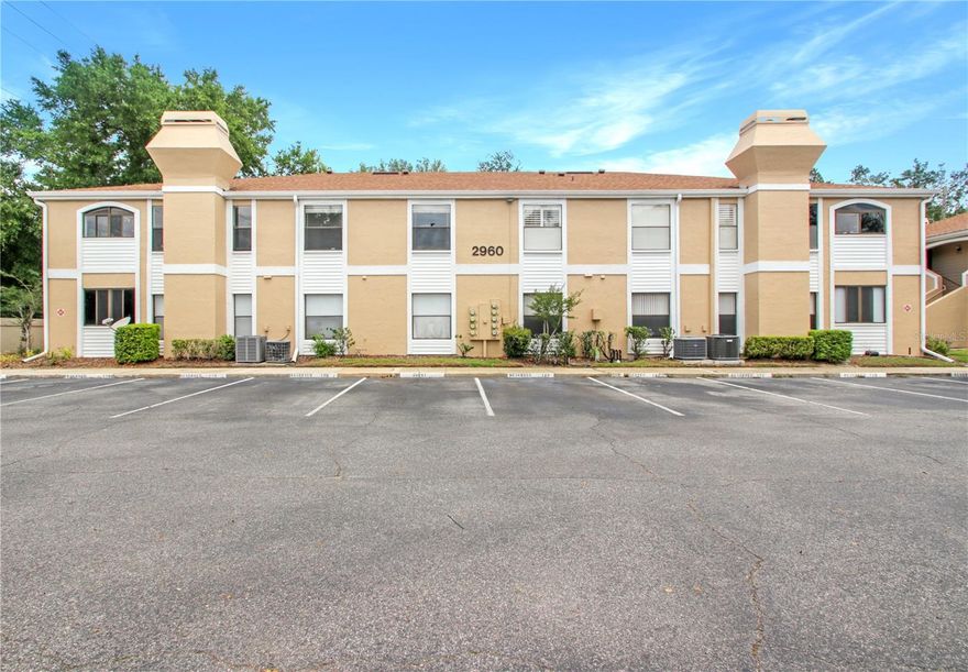 Conveniently located in the gated community of Wimbledon Park, this 2-bedroom, 2-bathroom condominium offers a functional 889 sq. ft. layout featuring a kitchen/family room combo. This residence provides an effortless, low-maintenance lifestyle as the monthly association fee includes water, sewer, and trash removal, along with exterior upkeep. Residents enjoy access to a full suite of resort-style amenities, including a sparkling community pool, clubhouse, on-site gym, and sports courts for tennis and racquetball. Perfectly positioned for easy commuting, you are minutes away from the Orlando International Airport (MCO) and major transit routes like the 408 and 528, with Downtown Orlando just a short 10–15 minute drive away. Please note that the community maintains lease restrictions and requires association approval for new owners and tenants.