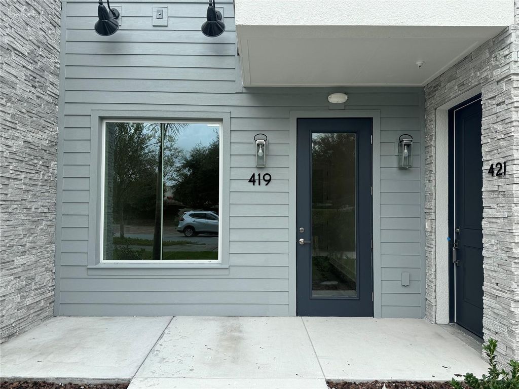 Photo of 419 Mike Roberto Way, Oviedo, FL 32765 (MLS # A4690424)